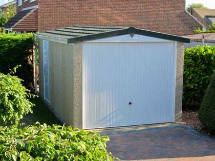 Cheltenham Concrete Garages showing door, drive and next door house