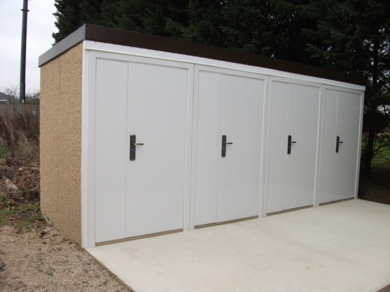 Ministor concrete sheds shown with four closed doors